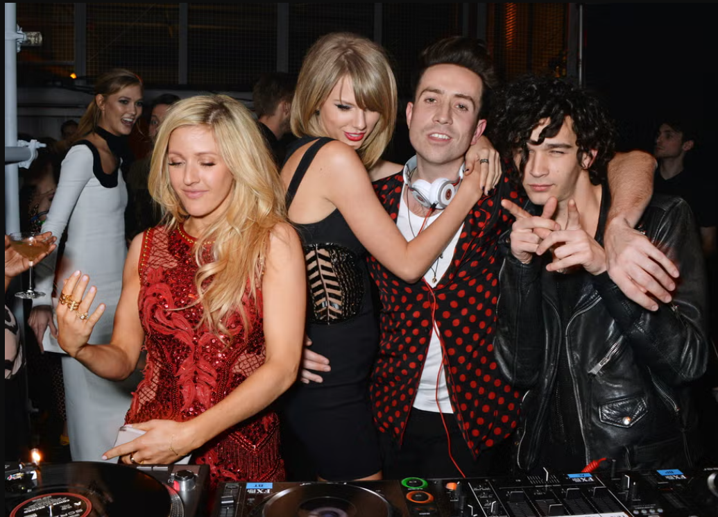 Matt Healy and Taylor Swift seen in a public entertainment context representing music industry attention.