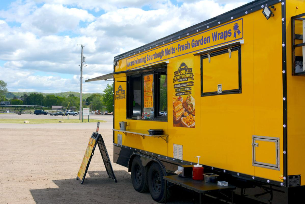 Monkey Business food truck parked at a local food truck rally serving customers